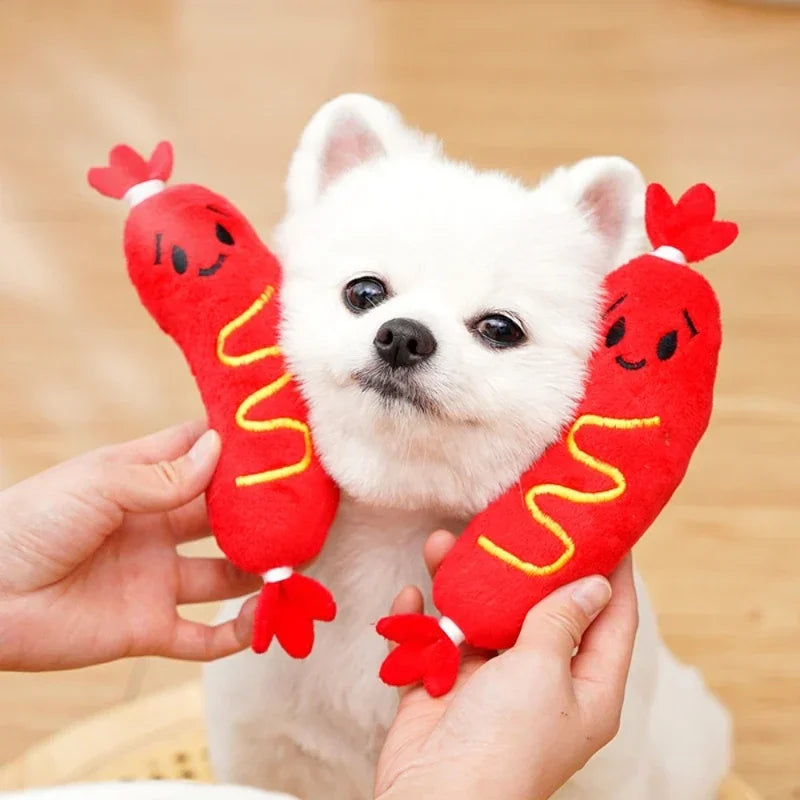 Essenza Pet SnackBite — Juguete Mordedor para Perros | Peluche con Sonido, Textura Divertida y Diseño de Perrito Caliente