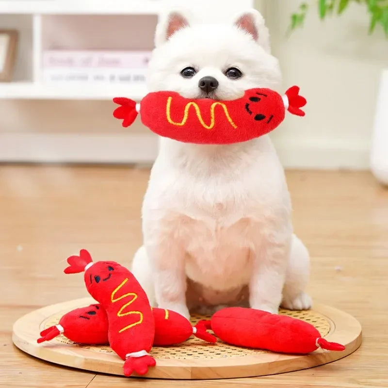 Essenza Pet SnackBite — Juguete Mordedor para Perros | Peluche con Sonido, Textura Divertida y Diseño de Perrito Caliente