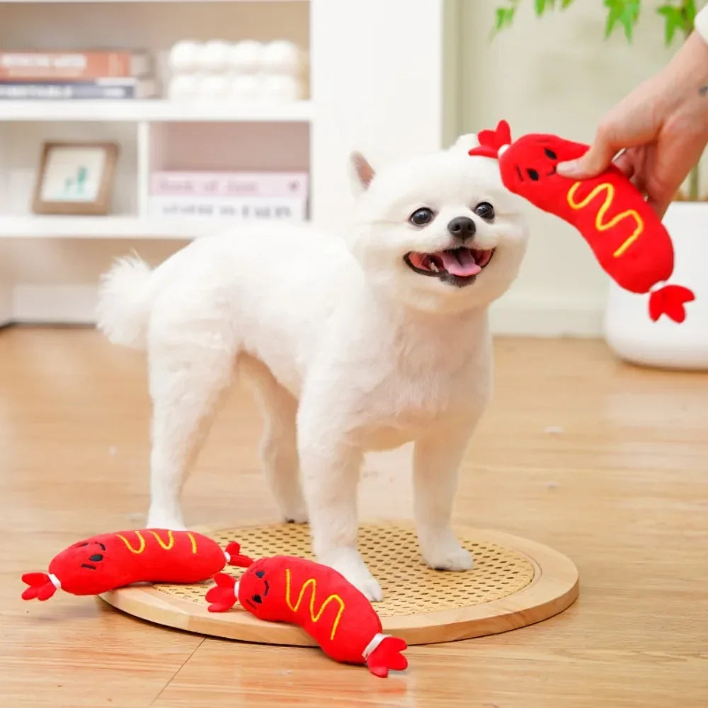 Essenza Pet SnackBite — Juguete Mordedor para Perros | Peluche con Sonido, Textura Divertida y Diseño de Perrito Caliente